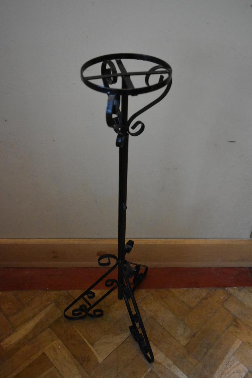 A wrought iron lamp stand on scrolling tripod base. H.105 Dia.18cm - Image 2 of 6