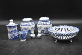 A collection of blue and white Chinaware. Including, a pair of ginger jars, a pierced bowl, egg cup,