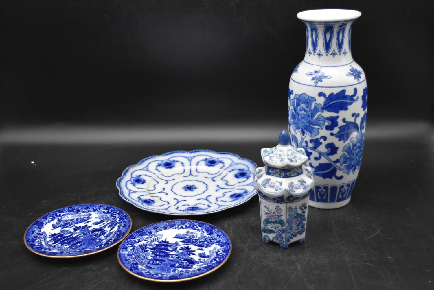 A collection of blue and white chinaware. Including, a chinese vase, pagoda form pot, floral