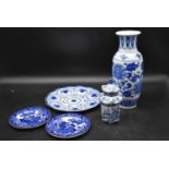 A collection of blue and white chinaware. Including, a chinese vase, pagoda form pot, floral