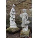 A pair of composite white painted garden statues of young female figures. One holding a bird and the