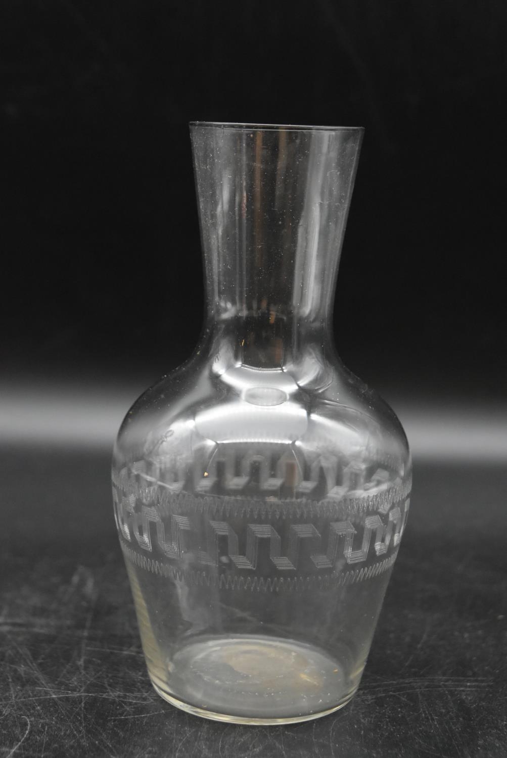 A late Victorian geometrically etched glass decanter with stopper and water carafe. H.30 Dia.14cm ( - Image 5 of 6