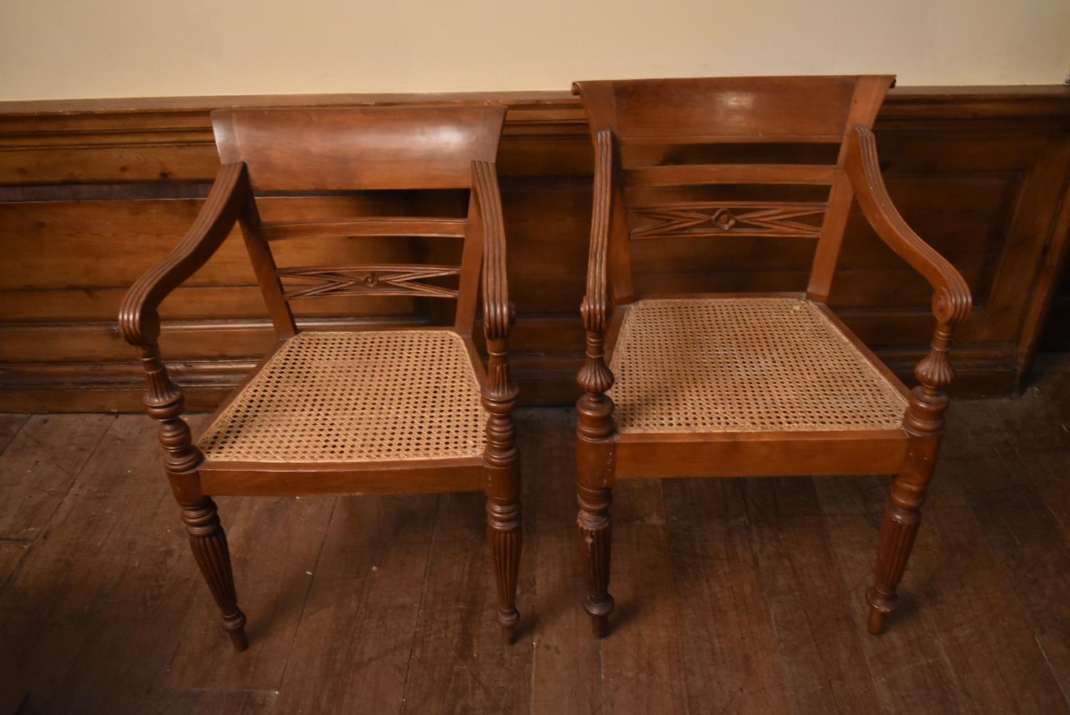 An Eastern teak Regency style open armchair with bar back above caned seat on reeded tapering - Image 2 of 9