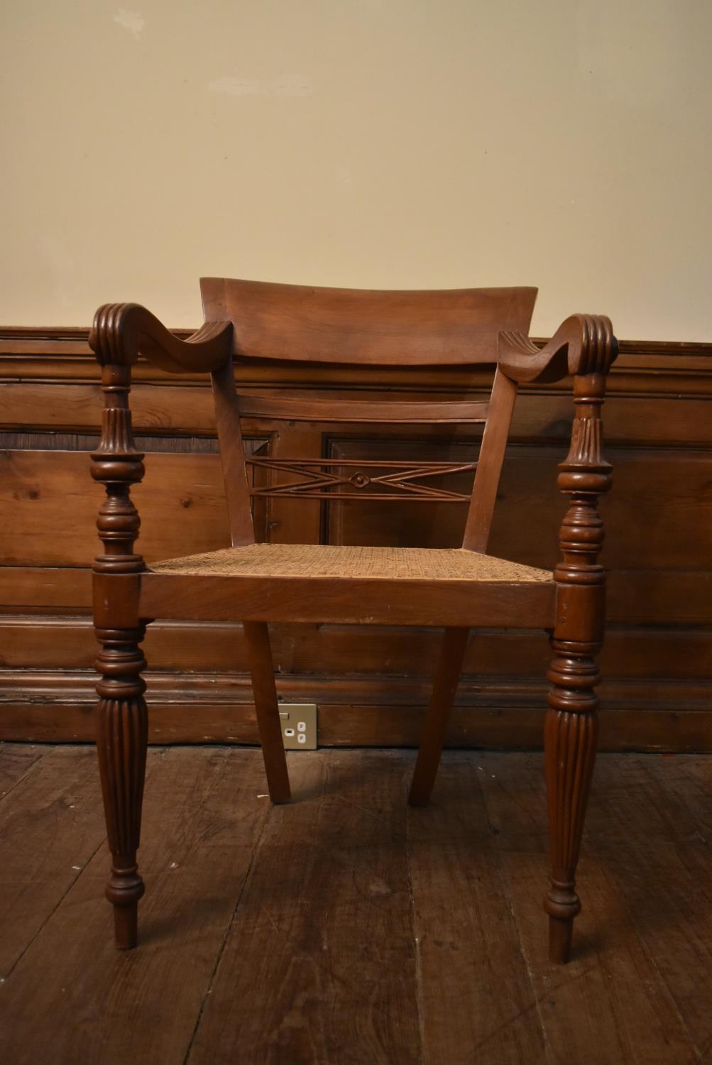 An Eastern teak Regency style open armchair with bar back above caned seat on reeded tapering - Image 6 of 9
