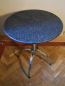 A marble topped occasional table on chromium sputnik style base. H.77 Dia.69cm
