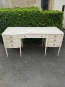 A mid century painted dressing table.