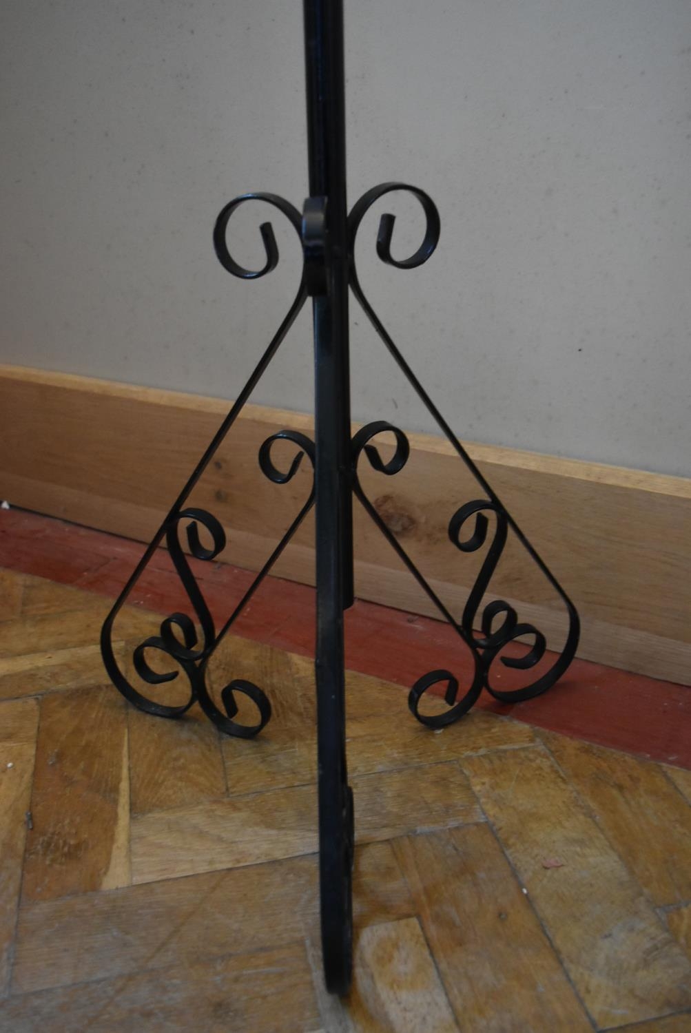 A wrought iron lamp stand on scrolling tripod base. H.105 Dia.18cm - Image 3 of 6