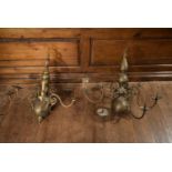 A pair of 20th century Dutch brass chandeliers with six scrolling branches mounted with sconce