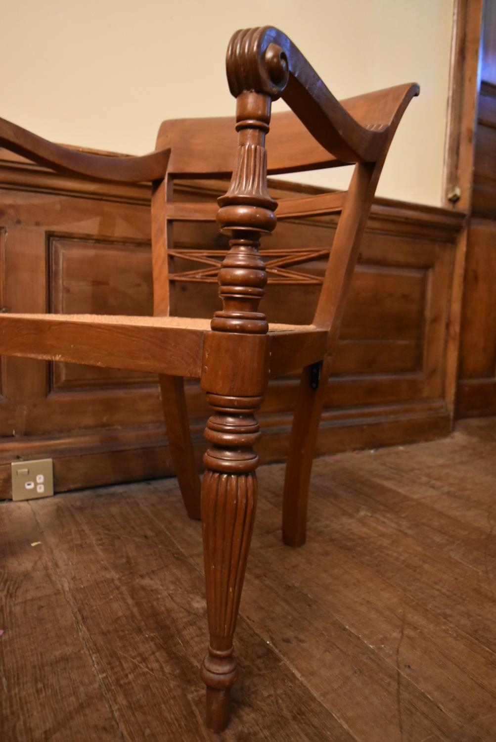 An Eastern teak Regency style open armchair with bar back above caned seat on reeded tapering - Image 9 of 9