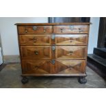 A William and Mary walnut chest with floral marquetry panels in various woods and oyster veneered