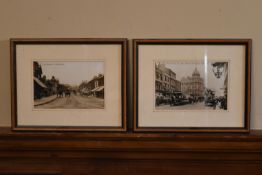 A pair of framed black and white reproduction photographs of London streets.