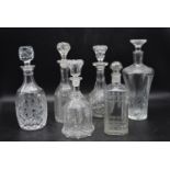 A collection of six cut glass and crystal decanters. Including, a Georgian Mallet Decanter, three