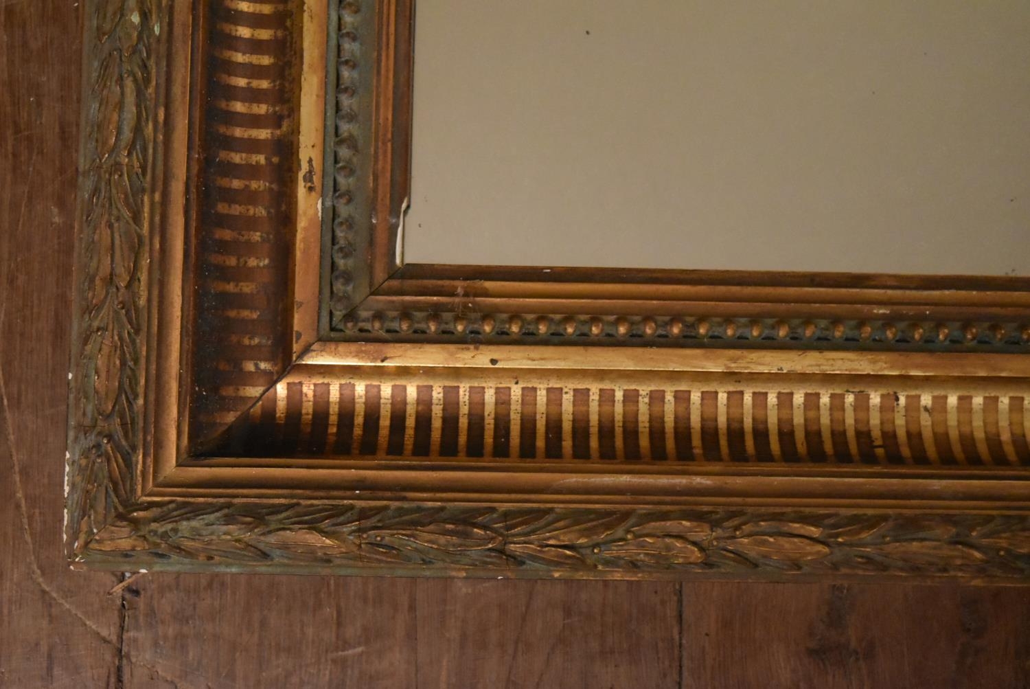 A 19th century carved gilt framed mirror with laurel motif and beading. H.57 W.77cm - Image 2 of 5