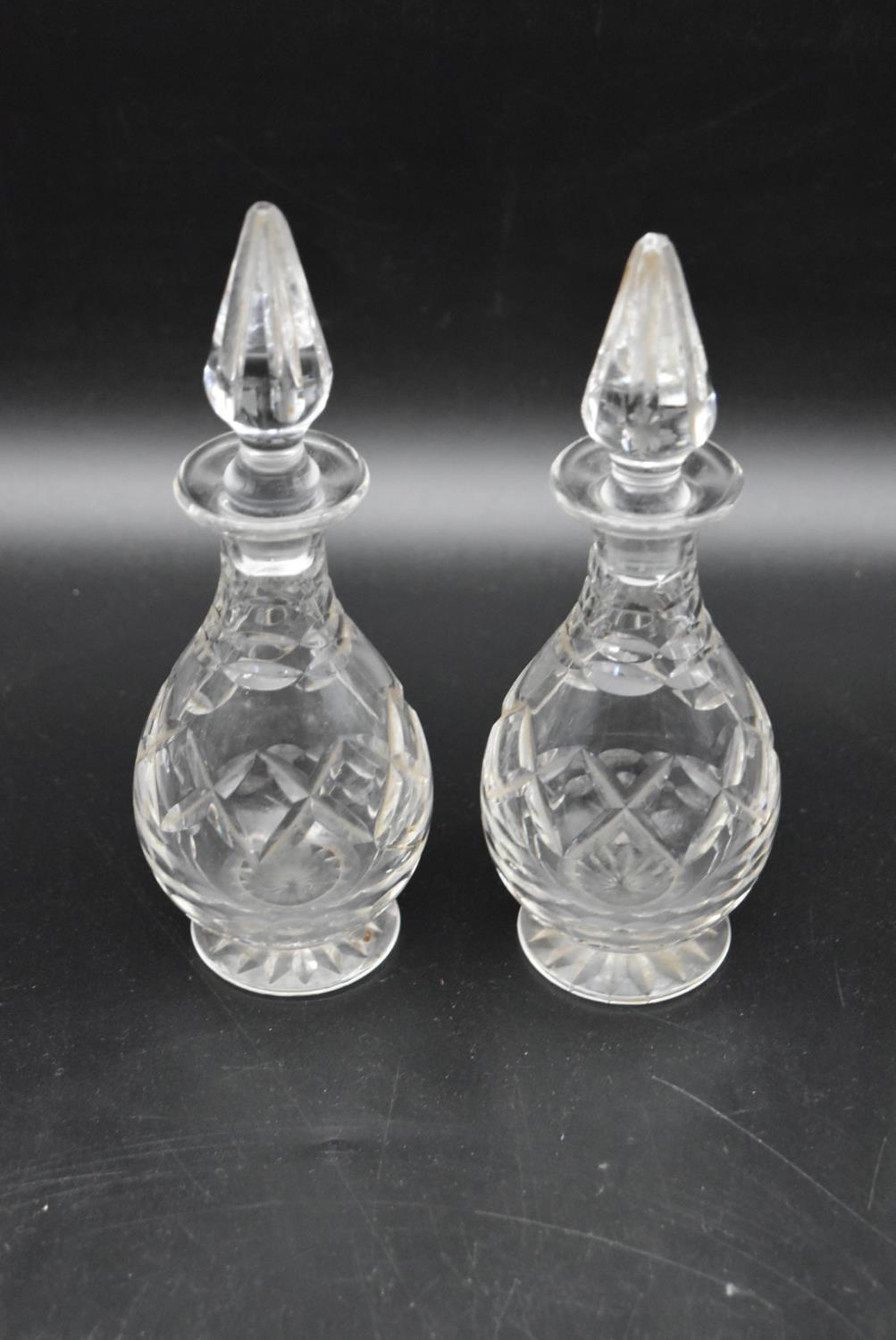 A pair of vintage crystal cut glass vinegar and oil bottles with tops. H.20cm (2) - Image 2 of 5