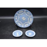 A set of three Wedgewood Jasperware plates, with a classical design and makers mark stamped to base.