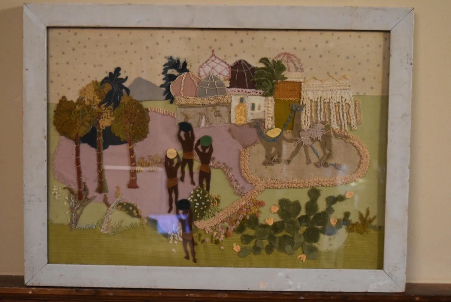 A framed and glazed embroidered panel, North African scene. H.43 W.58cm - Image 2 of 4