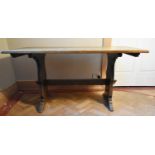 A vintage oak refectory style dining table on trestle supports. H.75 W.145 D.40cm