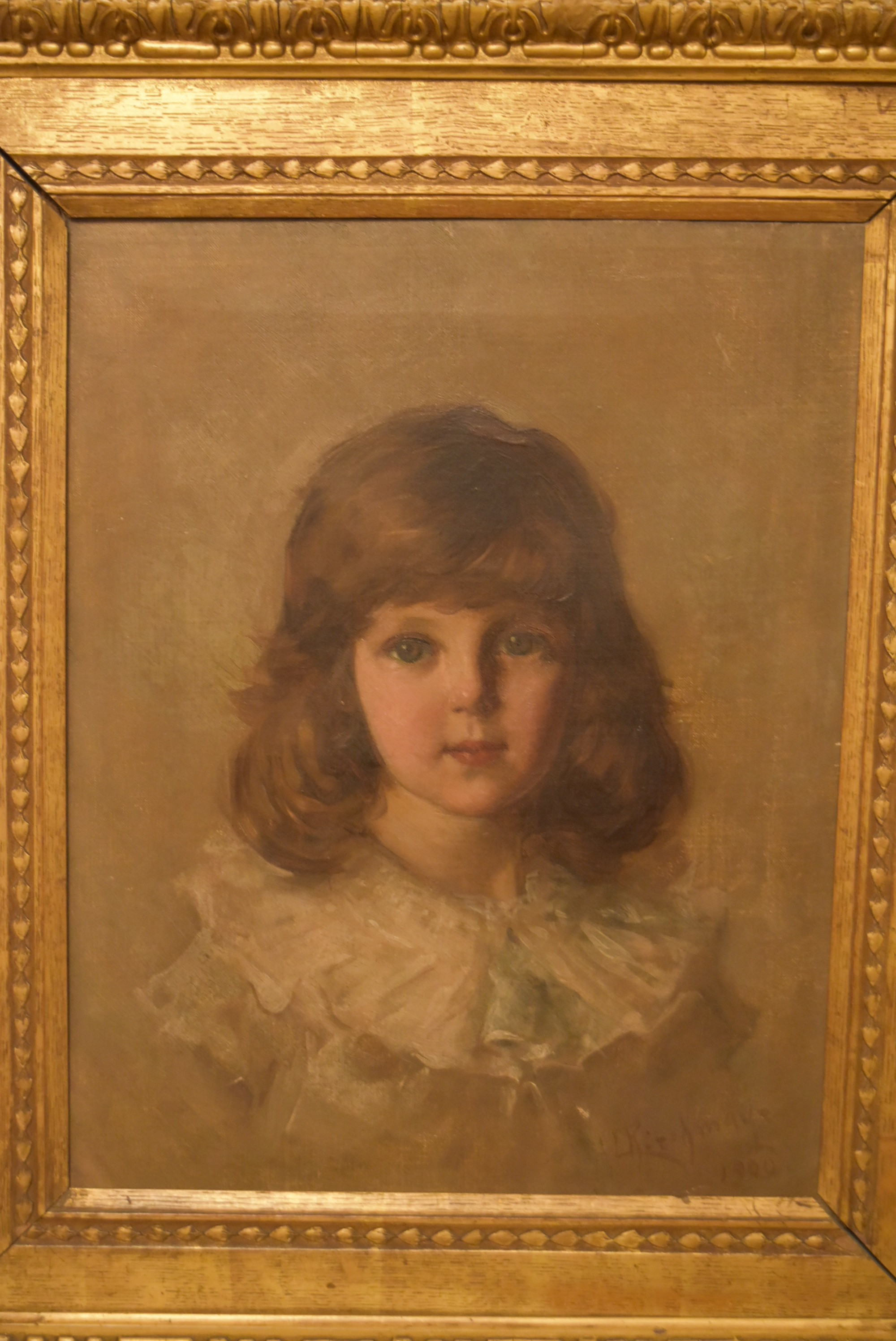 Cherubino Kirchmayr- A carved gilt framed oil on board of a little girl in a ruffled collar. - Image 2 of 4