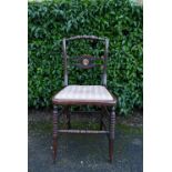 A Regency ebonised bedroom chair. H.83 W.40 D.35cm