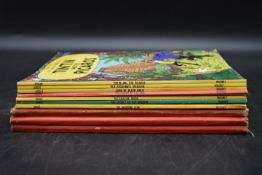 A collecction of ten vintage Tintin comic books. H.30 W.24cm (10)
