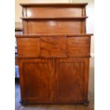 A 19th century mahogany chiffonier with raised and shelved upstand above deep frieze drawer and
