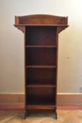An Edwardian Arts and Crafts inspired mahogany and satinwood inlaid narrow open bookcase. H.120 W.60