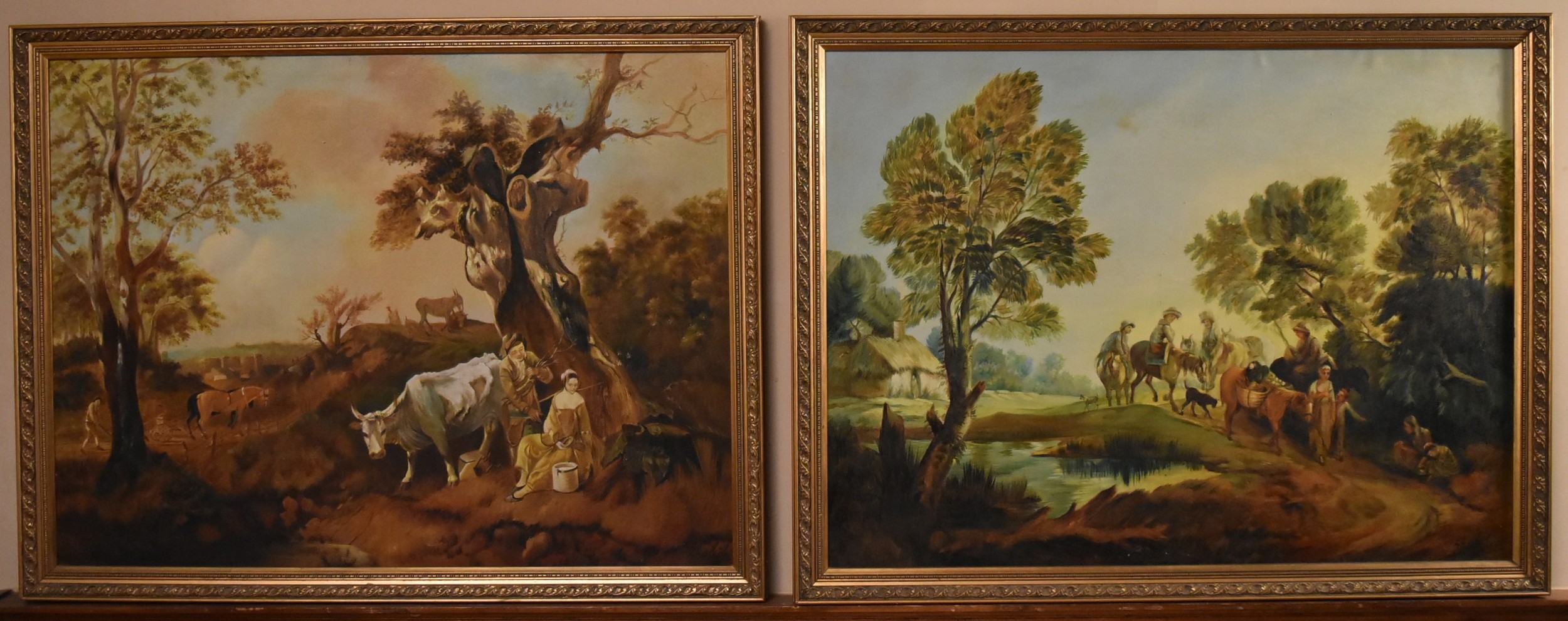 A pair of carved gilt framed oil on canvas landscapes. Signed Khalid. H.84 W.108cm (2)