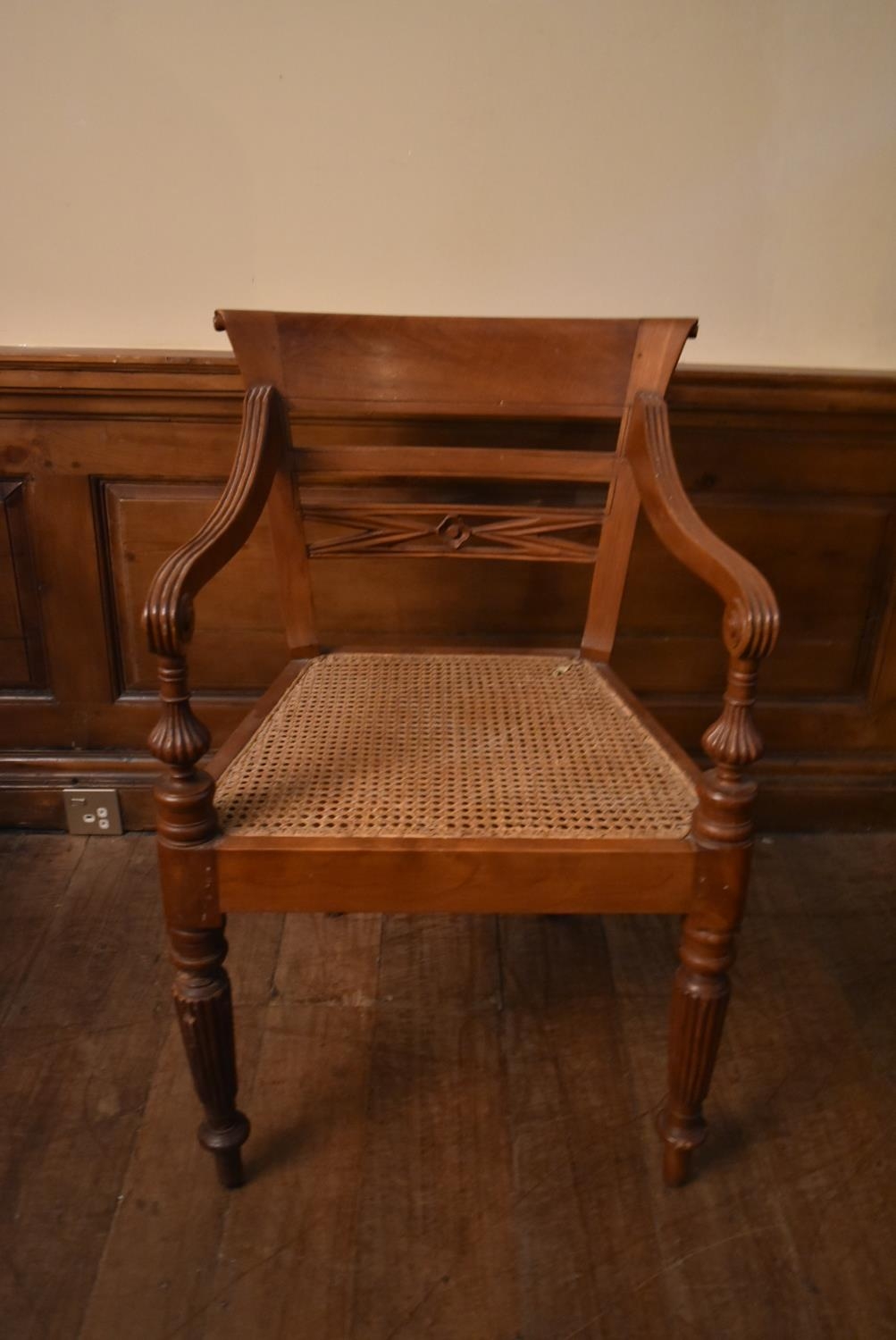An Eastern teak Regency style open armchair with bar back above caned seat on reeded tapering - Image 3 of 9