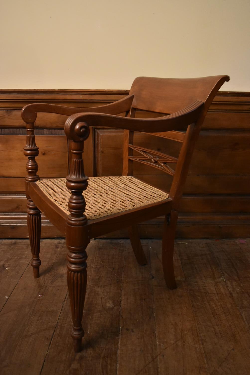 An Eastern teak Regency style open armchair with bar back above caned seat on reeded tapering - Image 8 of 9