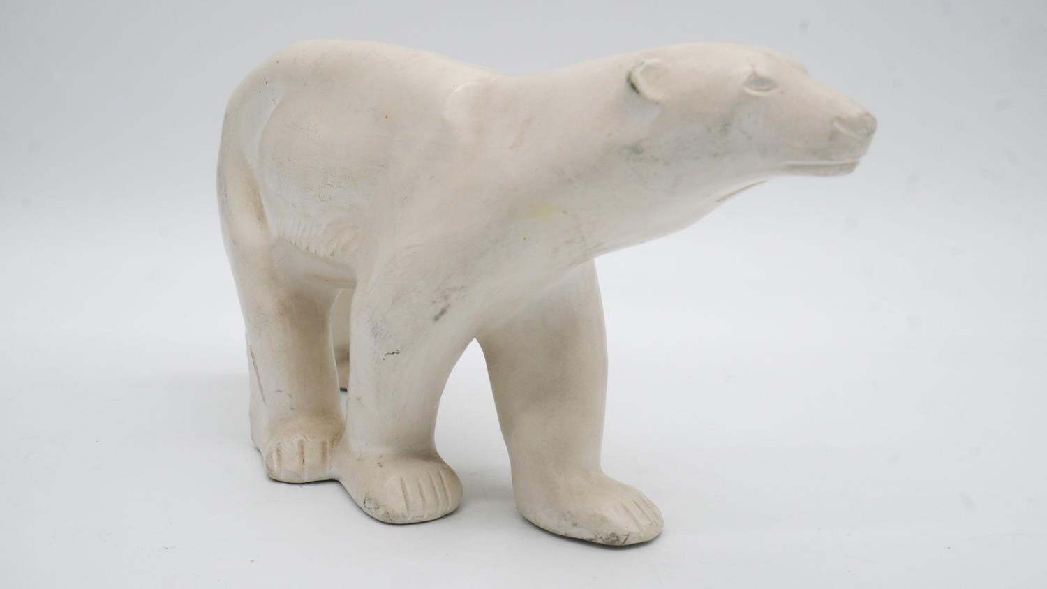A glazed ceramic cow along with a resin sculpture of a polar bear. H.23cm - Image 2 of 8