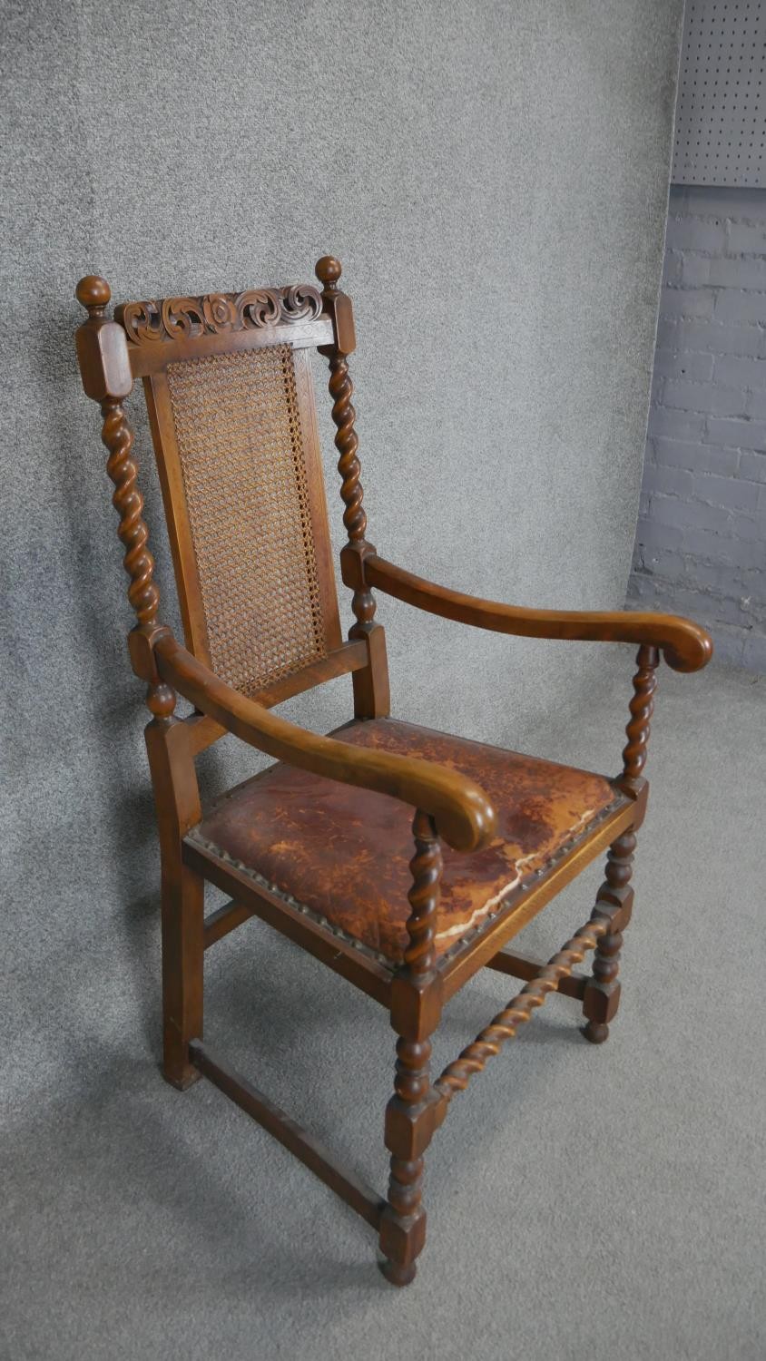 A mid century carved oak Carolean style armchair with caned back and leather seat on barleytwist - Image 2 of 3
