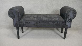 A contemporary upholstered scroll end window seat. H.55 W.100 D.30cm