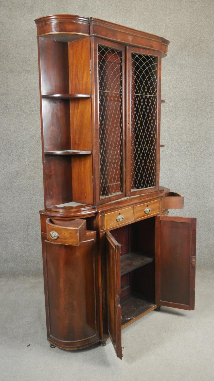 A 19th century style mahogany two section library bookcase of bowed outline. H.183 W.100 D.26cm - Image 3 of 5
