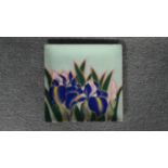 An enamel on copper square dish with Iris flower design. W.24 H.24