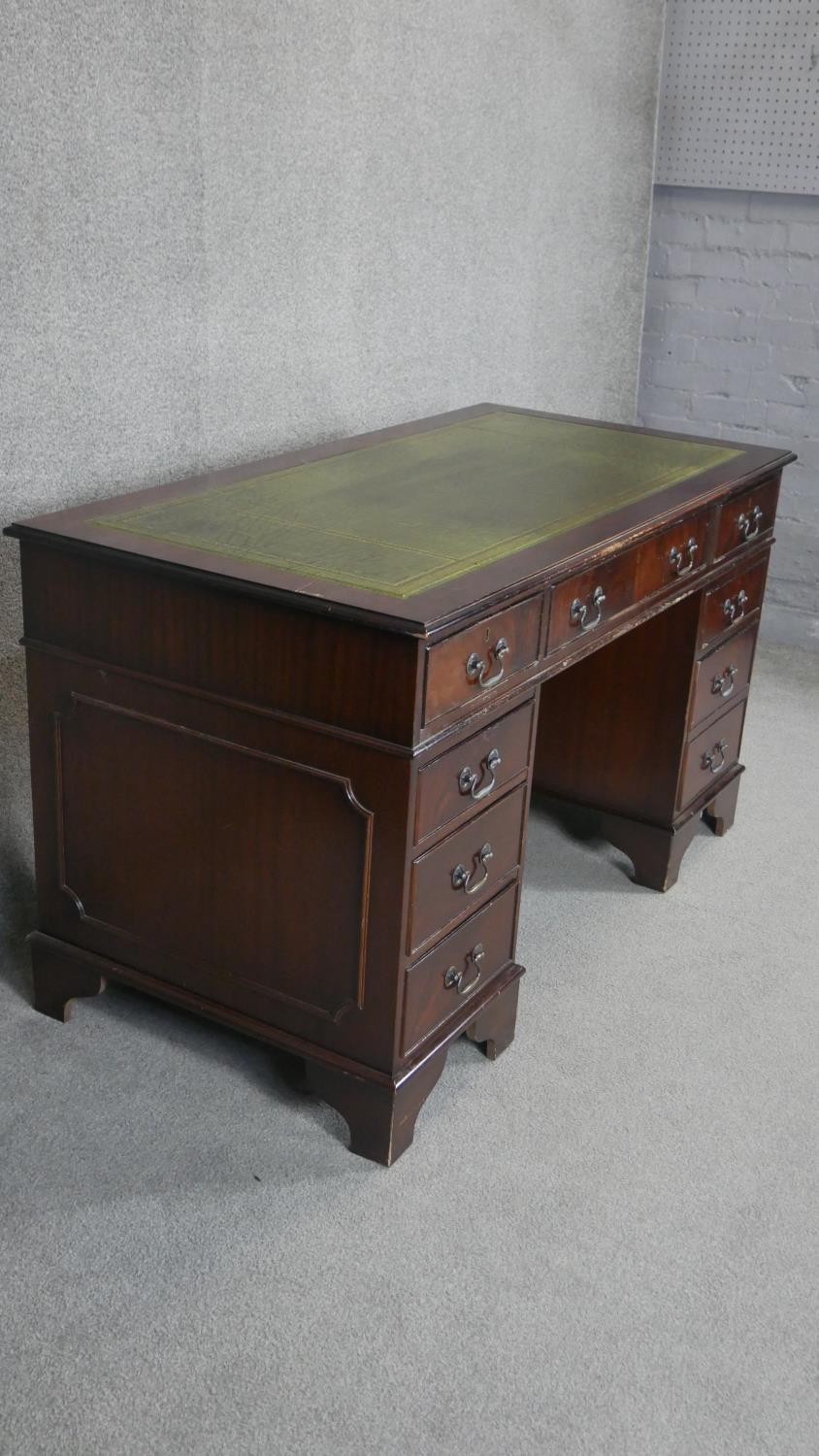 A Georgian style mahogany three part pedestal desk with inset tooled leather top. H180 W.136 D.67cm - Image 2 of 4