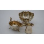 A collection of silver. Including a floral form pedestal bowl hallmarked: HM for Henry Matthews,