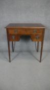 An early 20th century Georgian style mahogany lowboy on tapering square supports. H.80 W.77 D.50cm