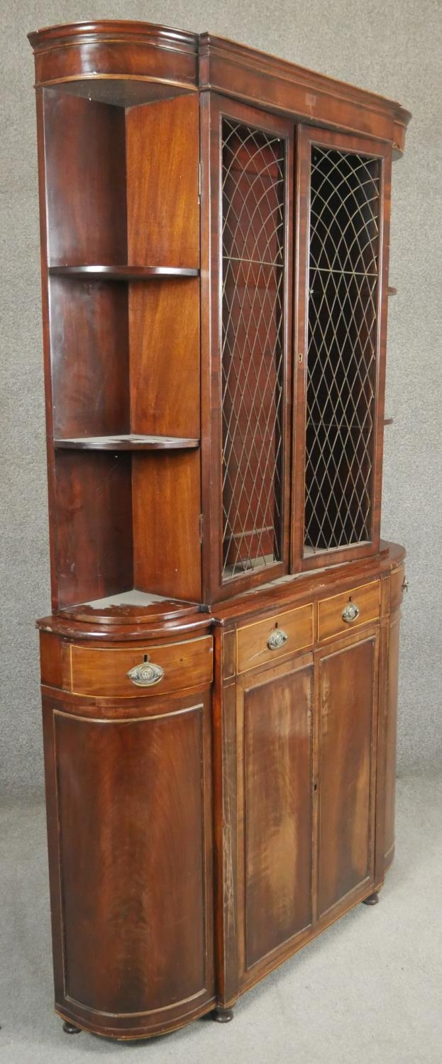 A 19th century style mahogany two section library bookcase of bowed outline. H.183 W.100 D.26cm - Image 2 of 5