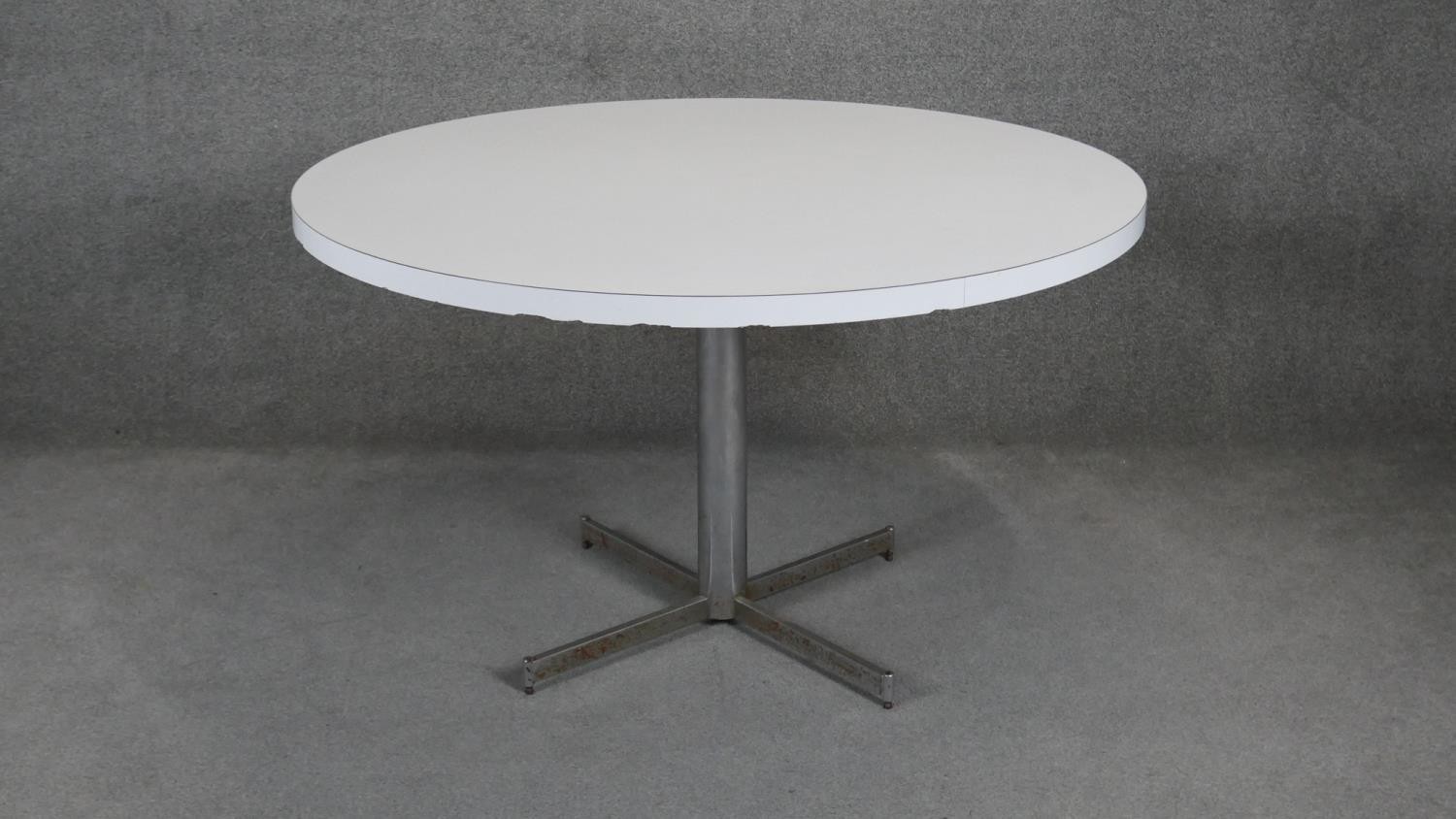 A vintage circular dining table on chrome base. D121 H71cm
