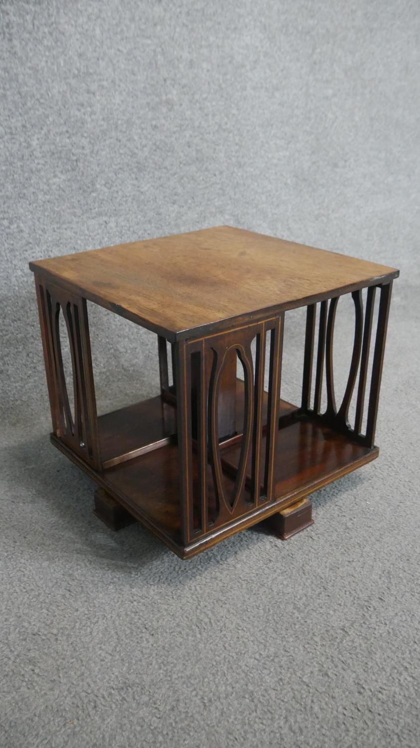 An Edwardian mahogany and satinwood inlaid revolving table top bookcase. H30 W36cm - Image 2 of 3