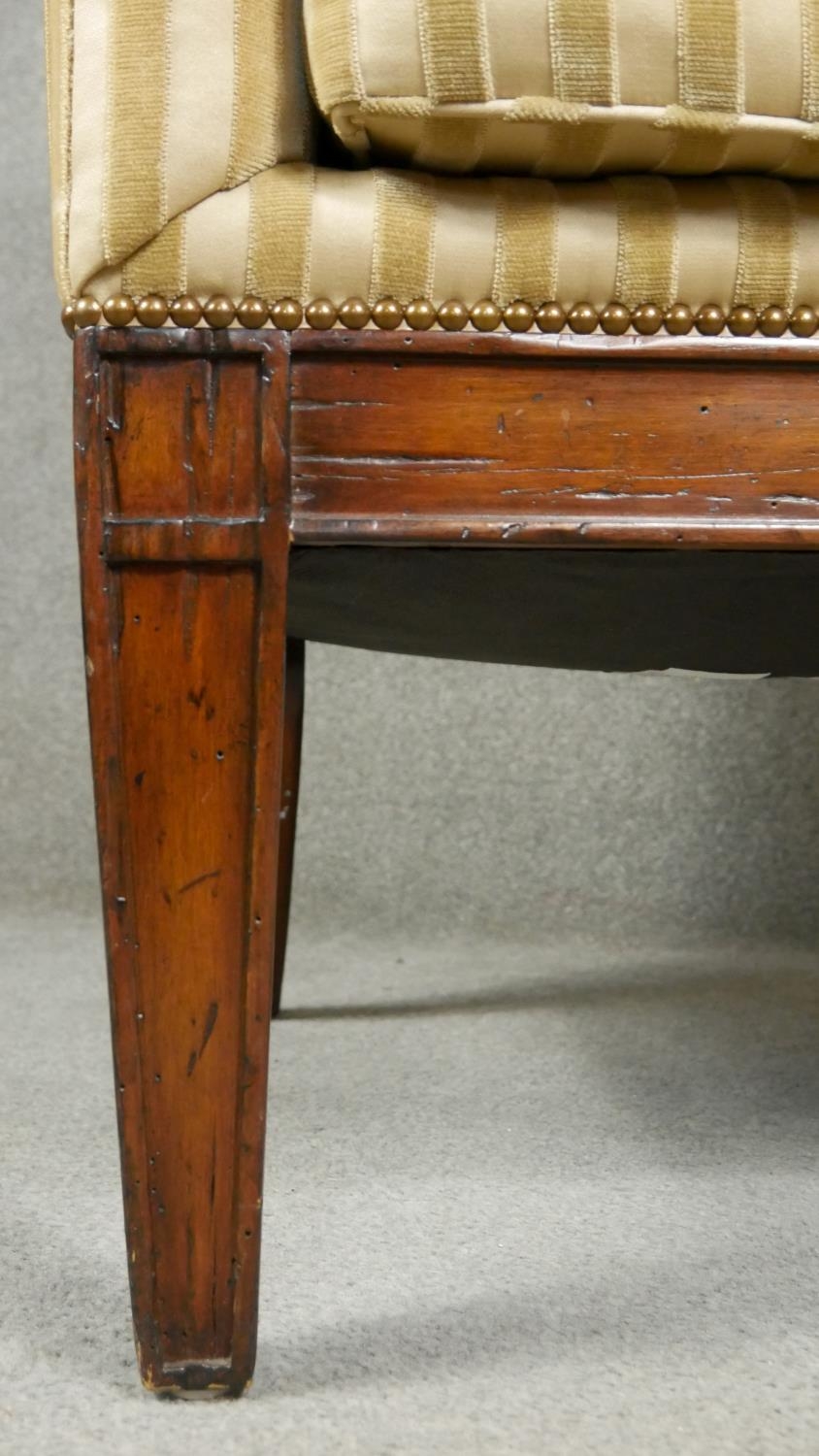 A Regency style mahogany upholstered library armchair on square tapering supports and sabre supports - Image 2 of 3
