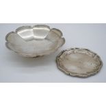 Two silver dishes. One silver floral design pedestal bowl hallmarked: M&W for Mappin and Webb,