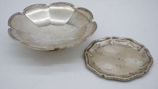 Two silver dishes. One silver floral design pedestal bowl hallmarked: M&W for Mappin and Webb,