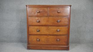 A 19th century mahogany chest with moulded rounded top and knob handles on plinth base. H.120 W.