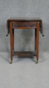 A Georgian style mahogany drop flap Pembroke table of small size. W42 D47 H55