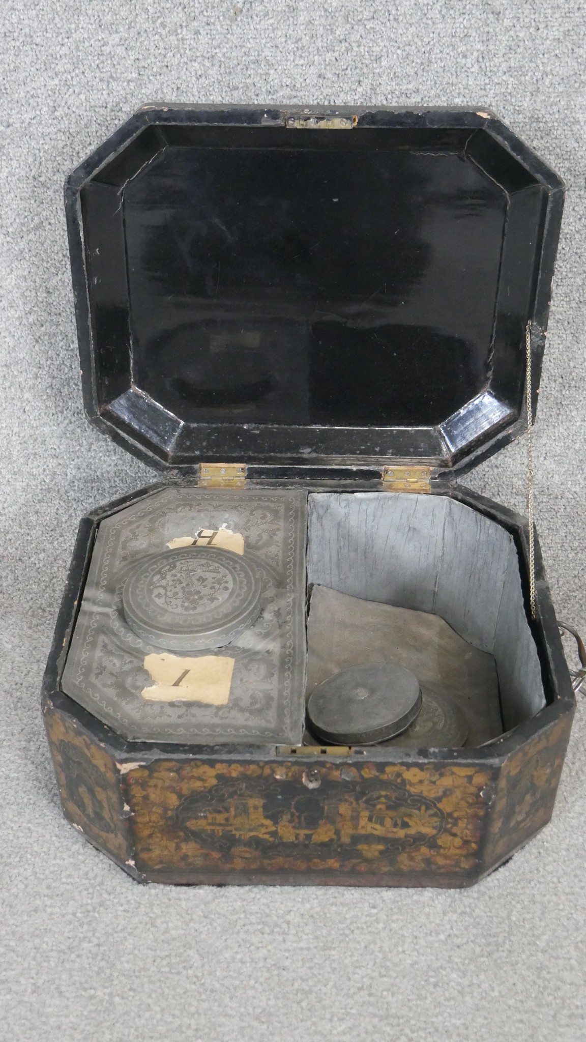 A 19th century lockable Chinese gilded lacquer tea box with engraved pewter lidded partitions. - Image 3 of 5