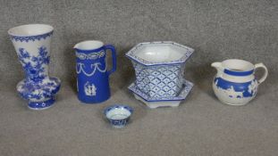 A collection of ceramics and porcelain. Including two Wedgwood jugs, one Jasperware and a collection