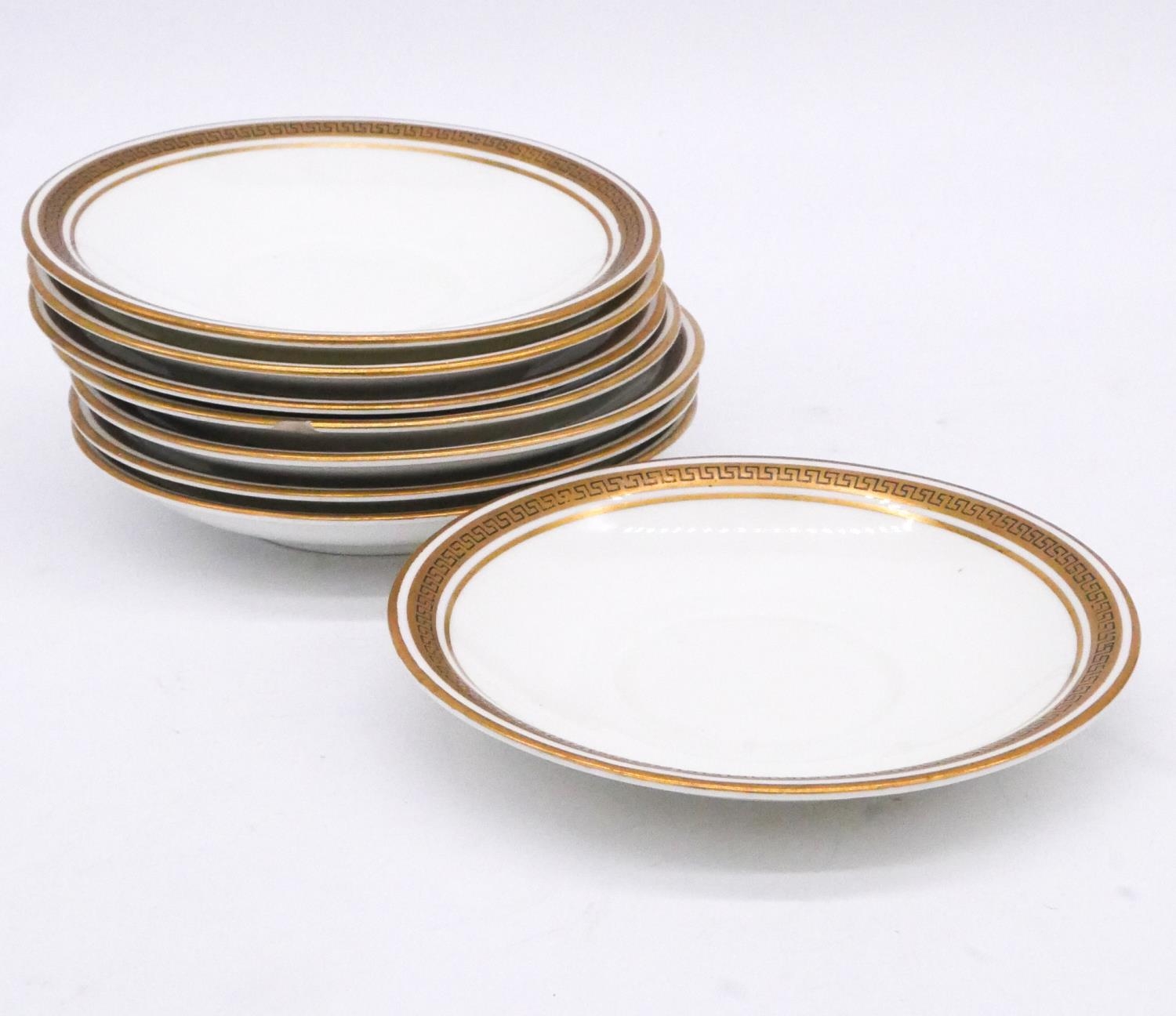 A set of twelve Aynsley 19th century hand painted and gilded porcelain saucers decorated with roses. - Image 6 of 9