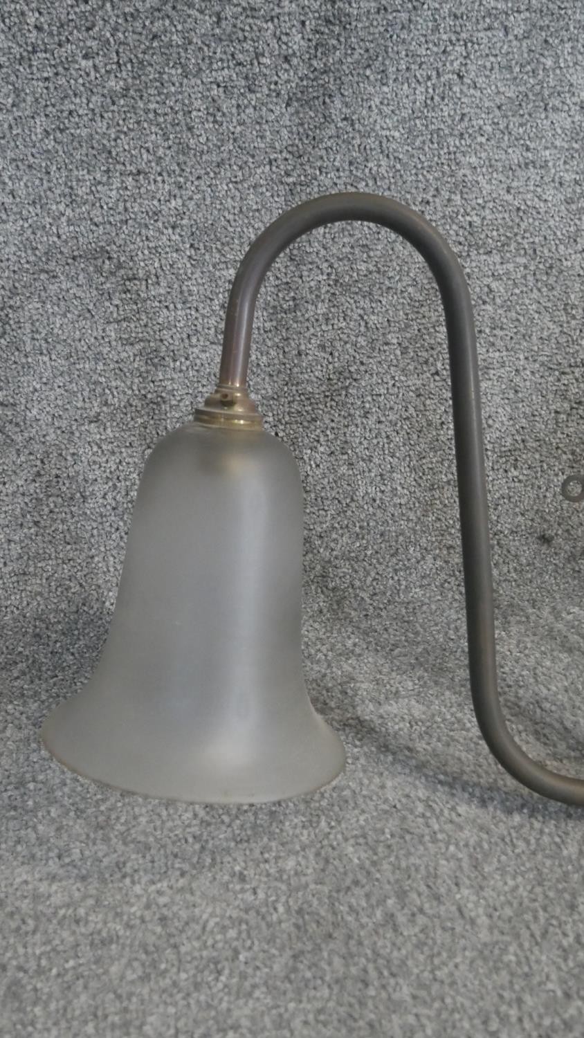 A vintage brass twin branch ceiling light with frosted bell shaped shades. H80cm - Image 2 of 3