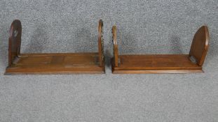 Two Victorian oak adjustable table top book slides (Both in need of some repair).